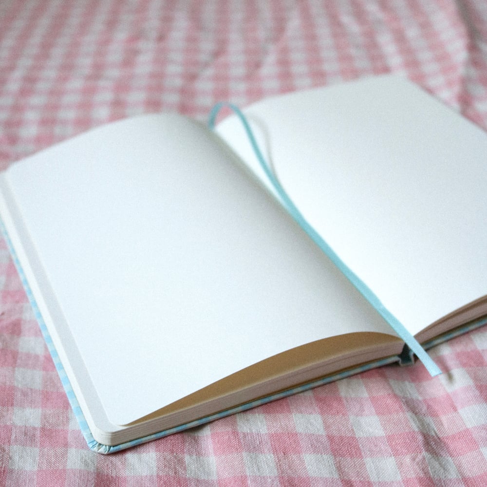 A5 journal (blank pages) + sticker freebie!